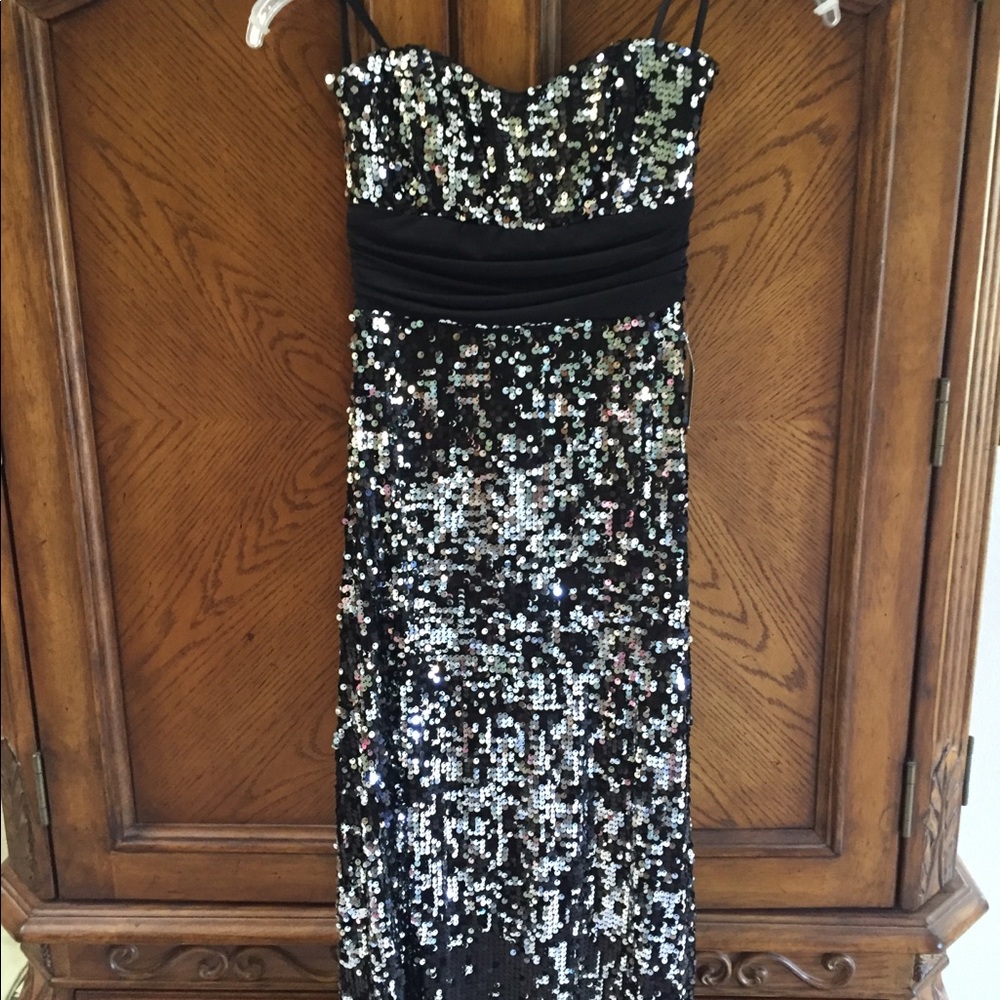 Long black and silver sequined dress